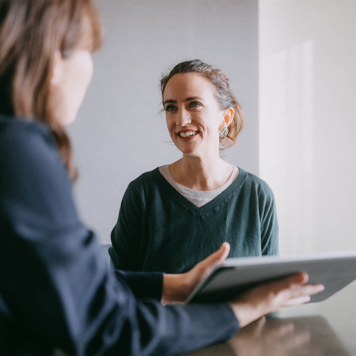 Woman meeting female banker for financial advice