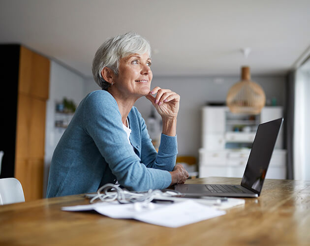 Woman working on her finances at home
