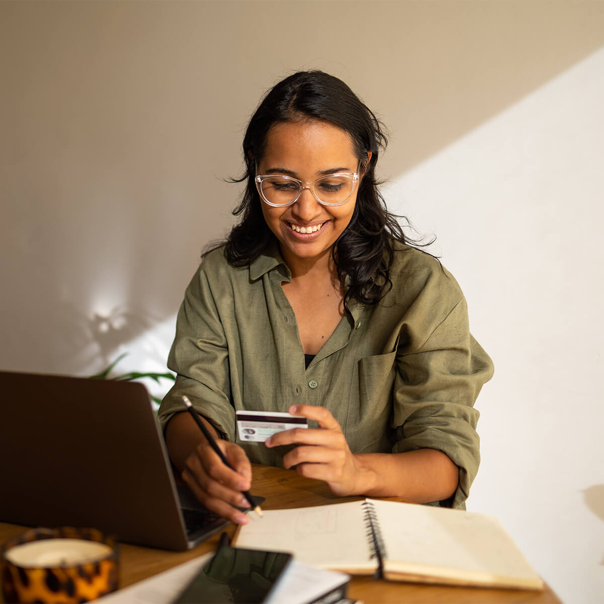 Woman pays credit card bill online