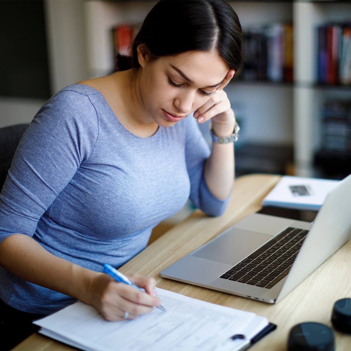 A woman at a computer begins her financial planning for the new year
