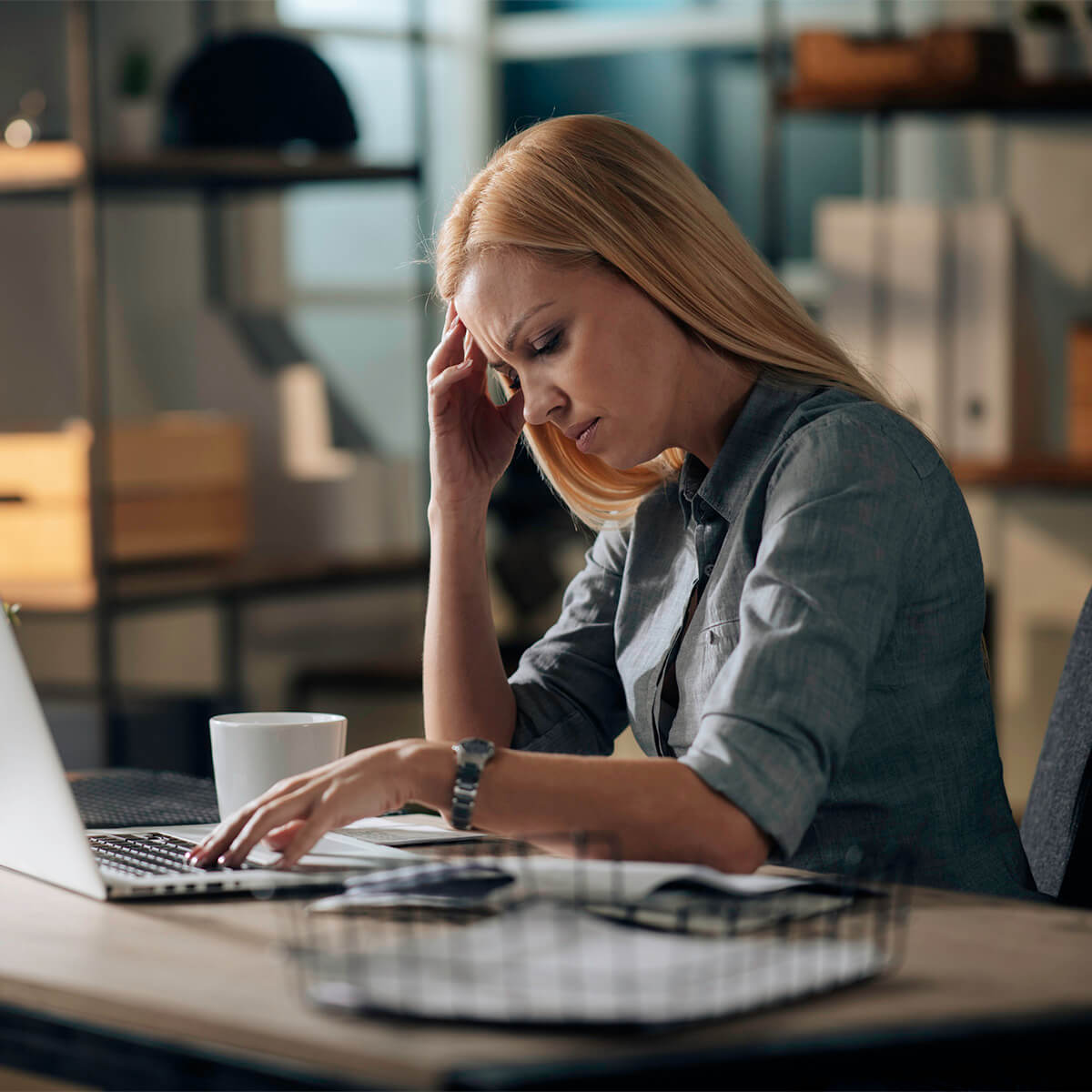 Woman using computer to assess mortgage options