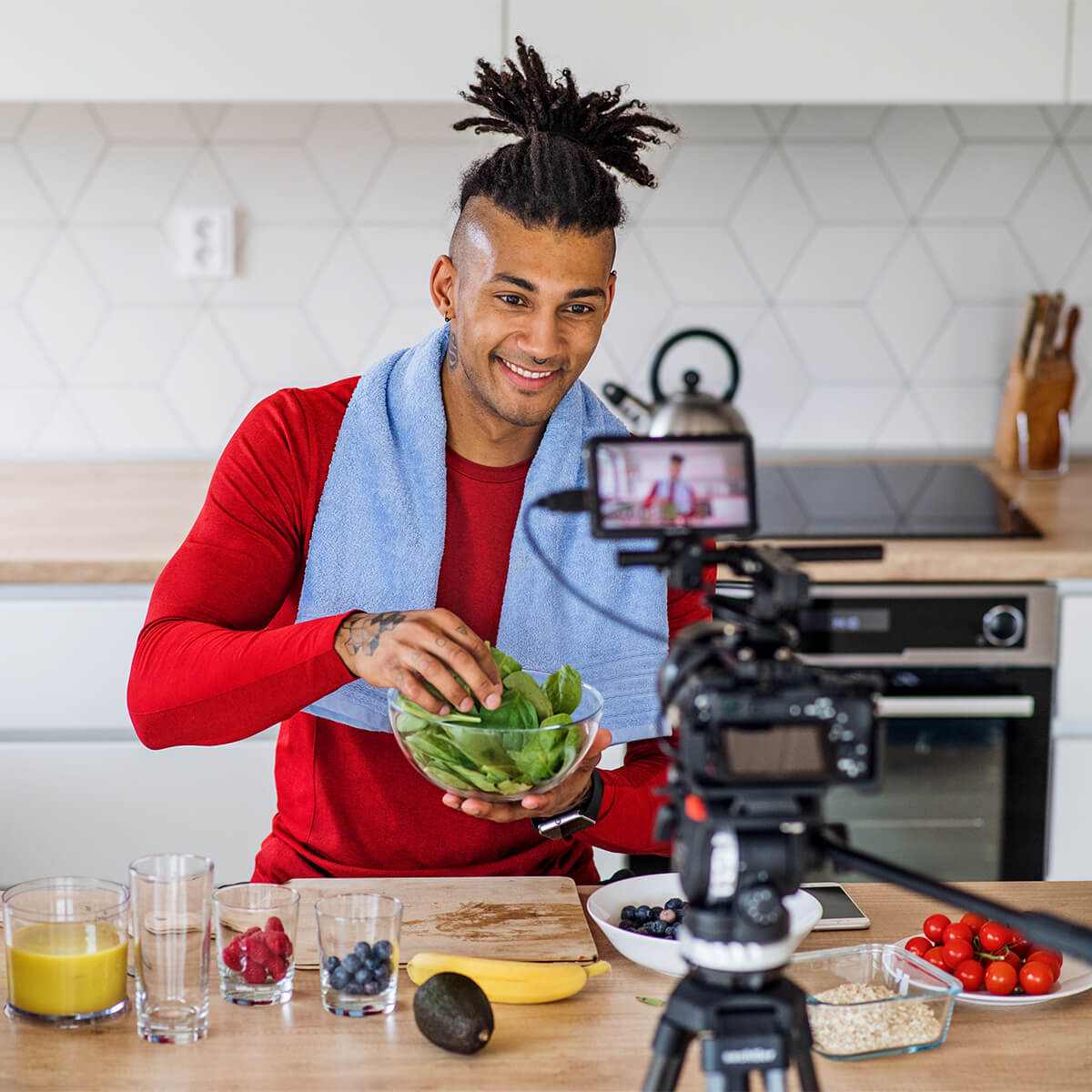 Young guy making a food video