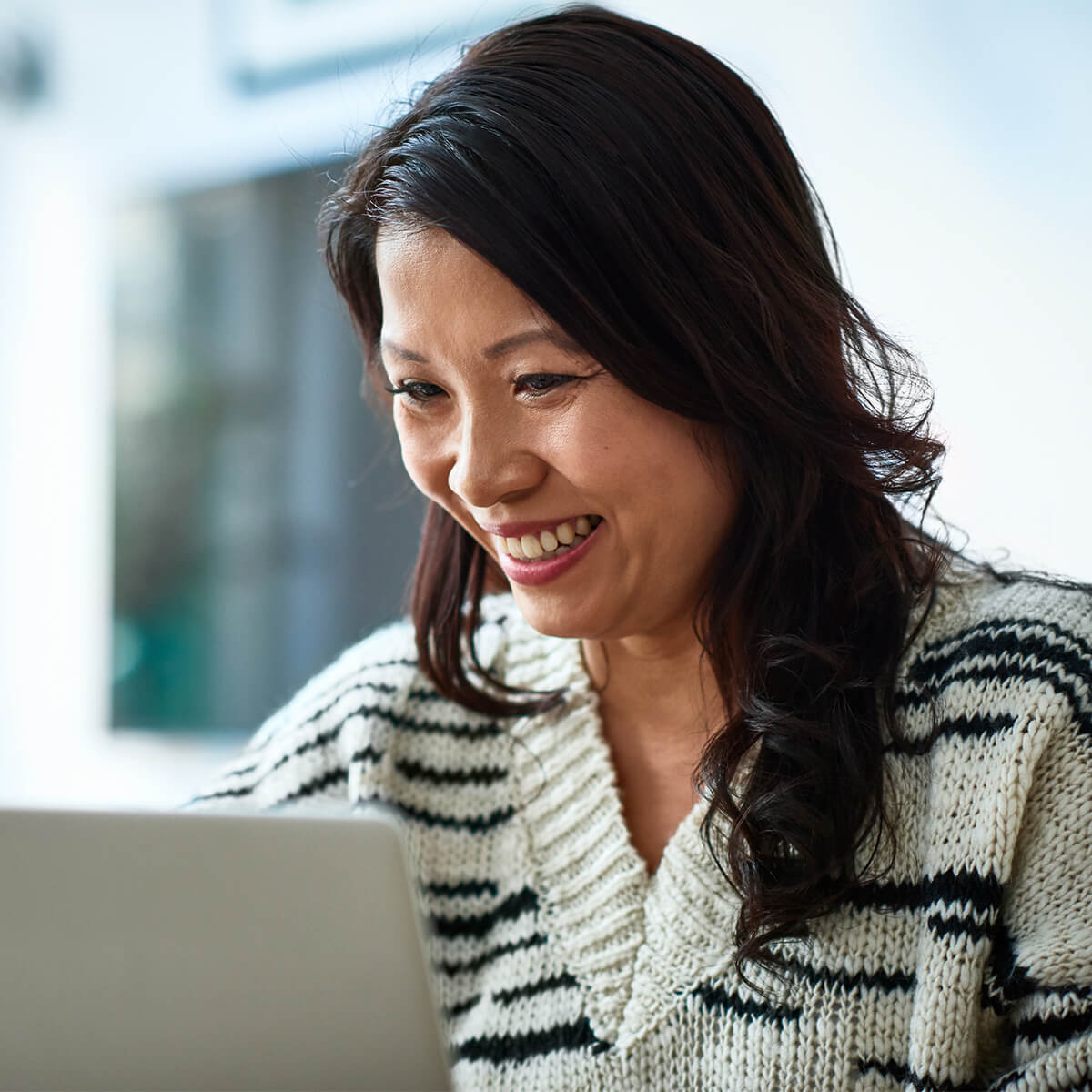 Woman looking at computer