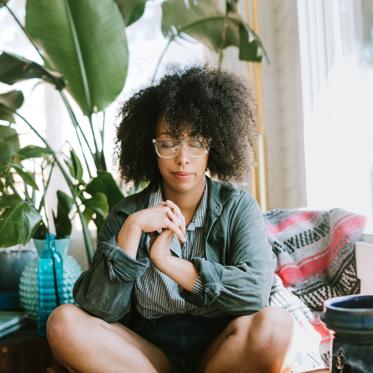 A young woman meditating