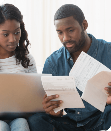 A couple looking over financial documents